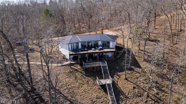 bird's eye view featuring a forest view