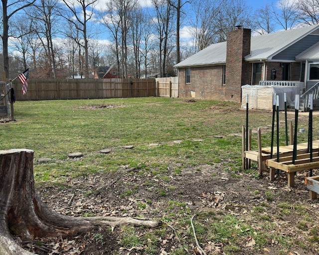 view of yard with fence