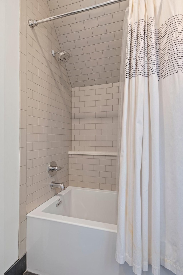 full bathroom with shower / bath combo with shower curtain