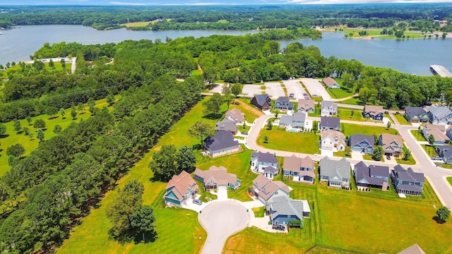 bird's eye view with a water view and a residential view