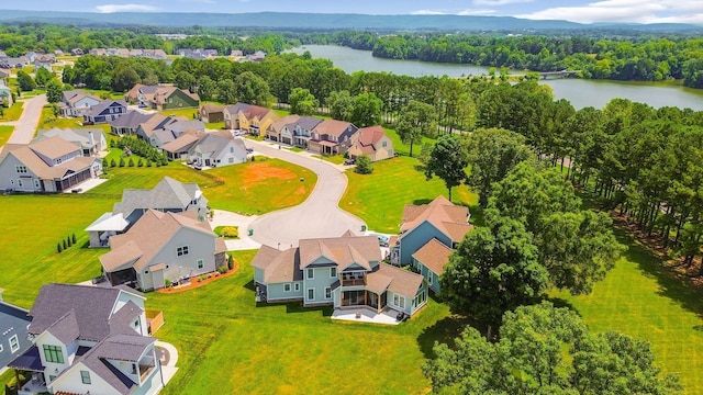 birds eye view of property featuring a residential view and a water view