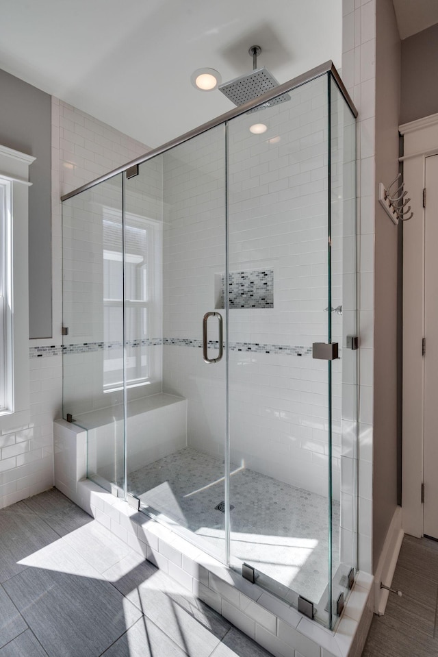 bathroom featuring a stall shower