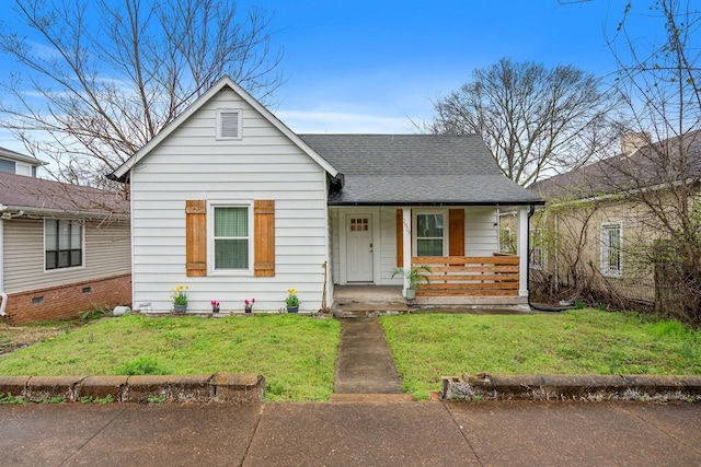 bungalow-style home featuring roof with shingles, a porch, and a front lawn