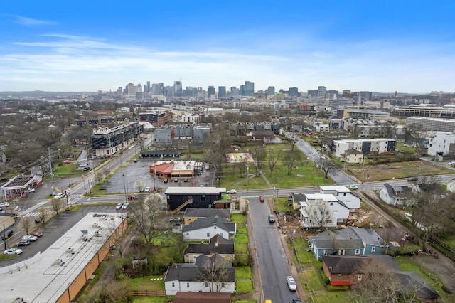 birds eye view of property featuring a view of city