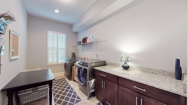 clothes washing area featuring recessed lighting, laundry area, baseboards, and separate washer and dryer