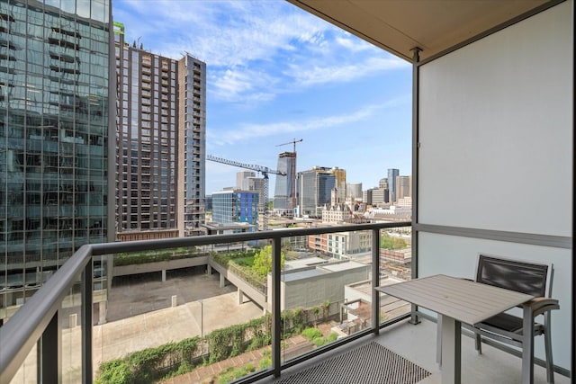 balcony featuring a city view