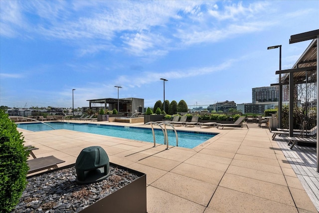 pool featuring a patio area