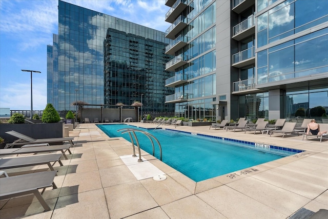 pool with a patio