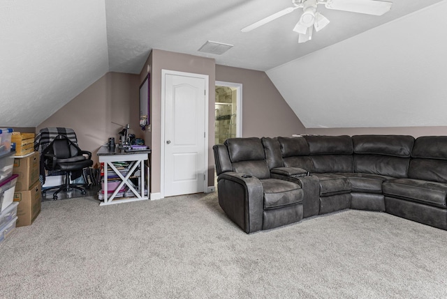 living area featuring visible vents, baseboards, lofted ceiling, ceiling fan, and carpet floors