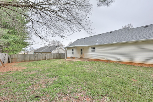 view of yard with a patio and a fenced backyard