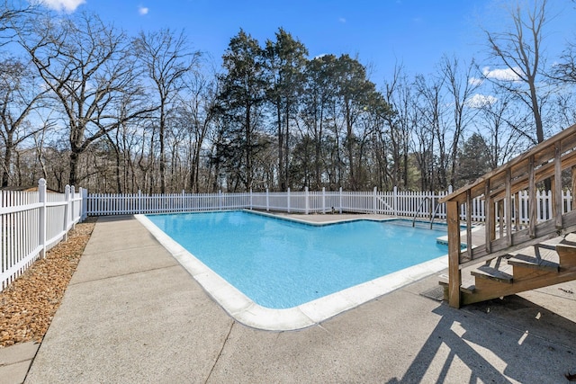 view of pool featuring a fenced in pool, a patio area, and a fenced backyard