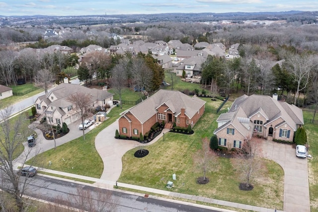 birds eye view of property with a residential view