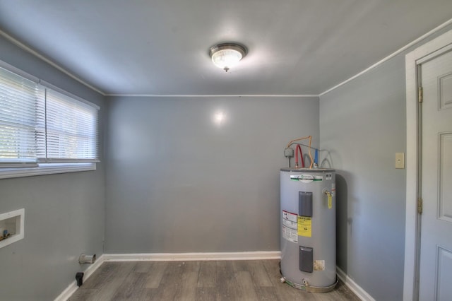 utility room with electric water heater