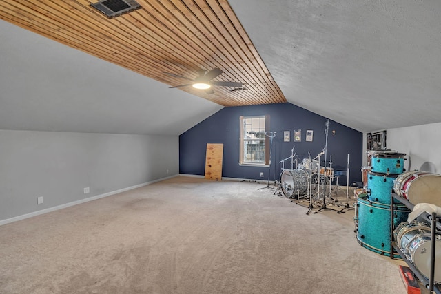 game room with lofted ceiling, carpet flooring, visible vents, and baseboards