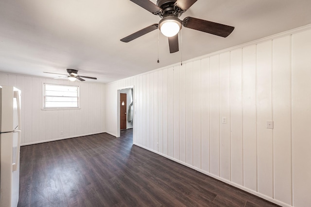 unfurnished room featuring dark wood-style floors