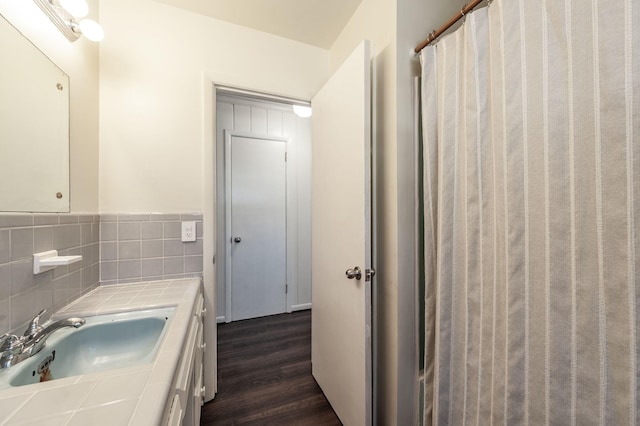 full bath with vanity and wood finished floors