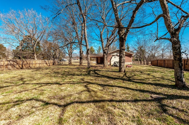 view of yard featuring a fenced backyard