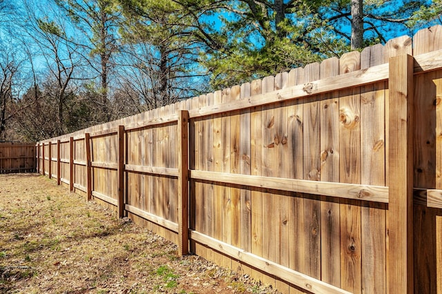 view of gate featuring fence