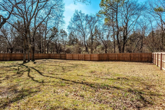 view of yard featuring a fenced backyard