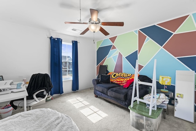 carpeted office space featuring a ceiling fan and visible vents