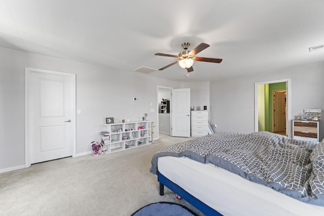 bedroom featuring carpet floors, visible vents, baseboards, and a ceiling fan