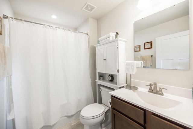 bathroom featuring toilet, visible vents, shower / tub combo with curtain, and vanity