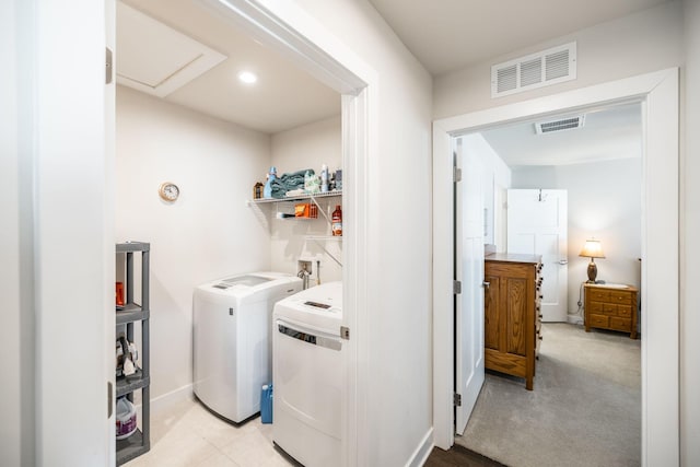 laundry area featuring attic access, laundry area, visible vents, and independent washer and dryer