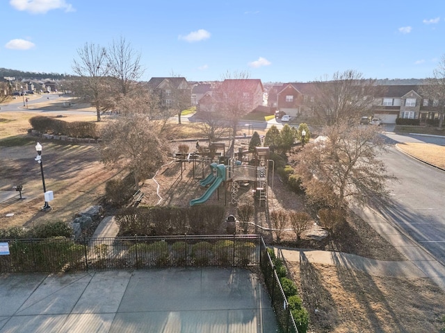 birds eye view of property with a residential view