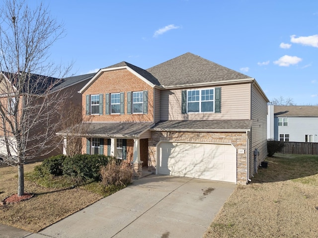 view of front of property featuring a shingled roof, fence, a garage, stone siding, and driveway