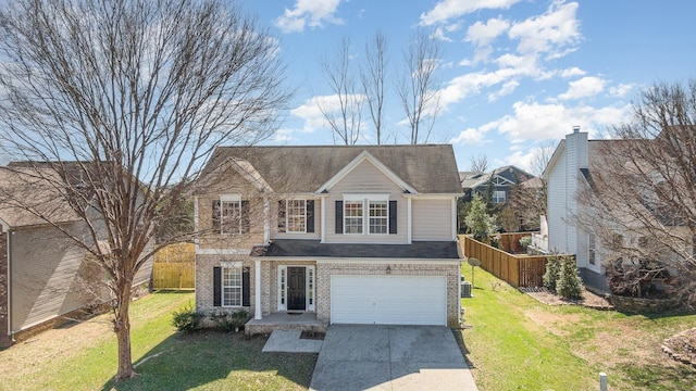 traditional home featuring brick siding, fence, concrete driveway, and a front yard