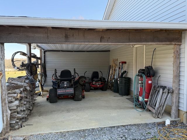 garage featuring a carport