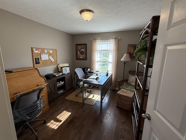 office space featuring dark wood finished floors and a textured ceiling