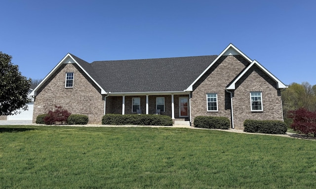 334 N Centerpoint Rd, Portland, TN 37148 - view of front of property featuring a front yard and brick siding