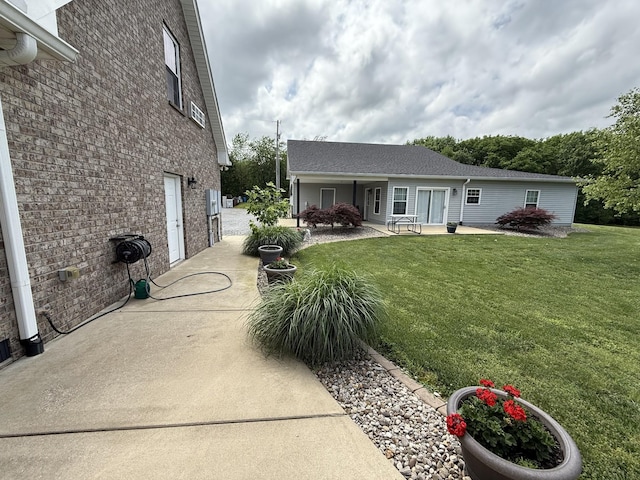 334 N Centerpoint Rd, Portland, TN 37148 - exterior space featuring a front lawn and brick siding