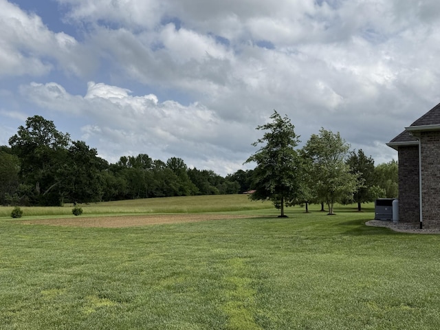 334 N Centerpoint Rd, Portland, TN 37148 - view of grassy yard featuring a forest view