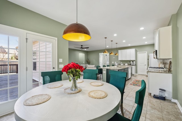 dining area with recessed lighting, ceiling fan, baseboards, and light tile patterned floors