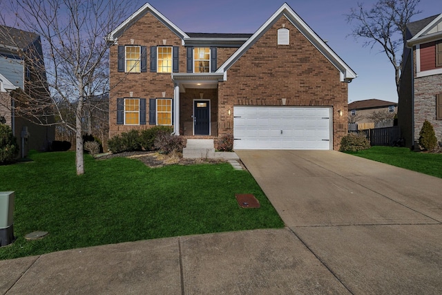 traditional-style home featuring a front lawn, concrete driveway, and brick siding