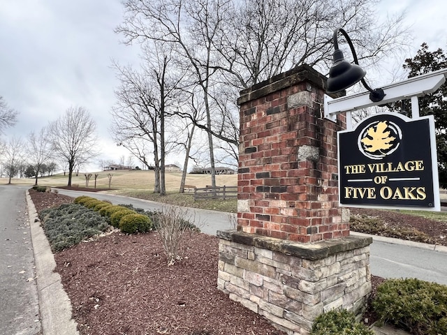 view of community sign