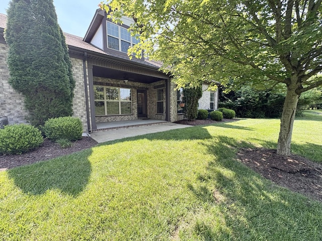 128 Village Cir, Lebanon, TN 37087 - view of green lawn featuring a patio