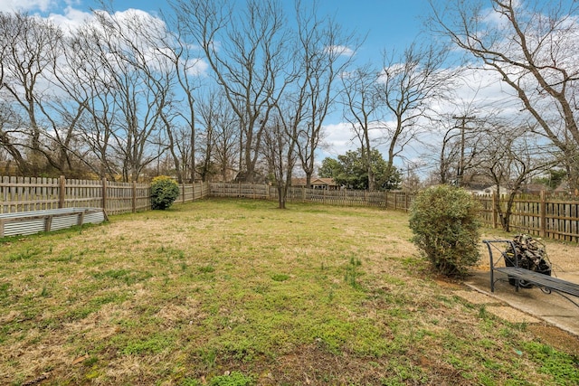 view of yard featuring a fenced backyard