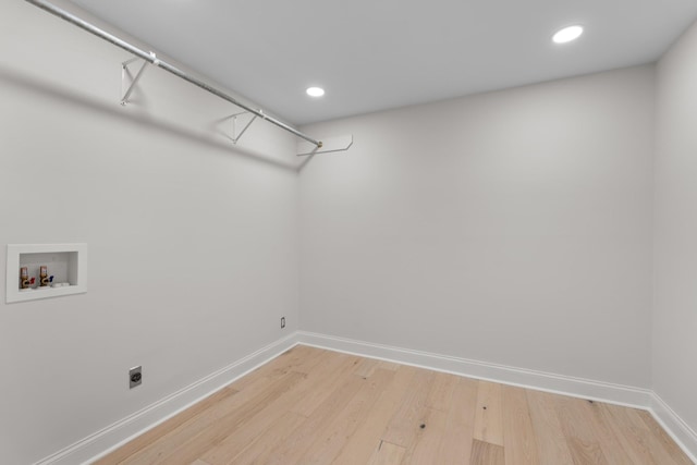 laundry room featuring washer hookup, recessed lighting, light wood-style floors, electric dryer hookup, and baseboards