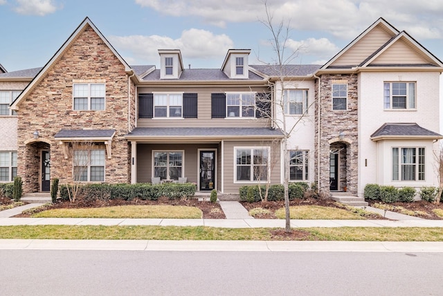 multi unit property featuring stone siding