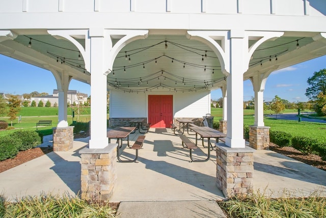 view of patio / terrace with a gazebo and outdoor dining area