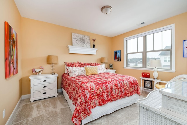 bedroom featuring carpet, visible vents, and baseboards