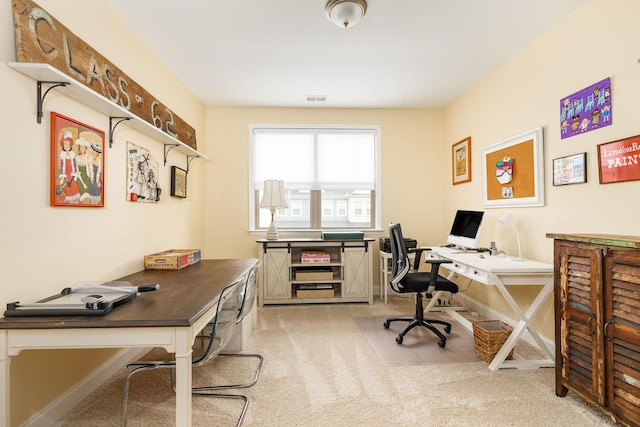 carpeted office featuring visible vents