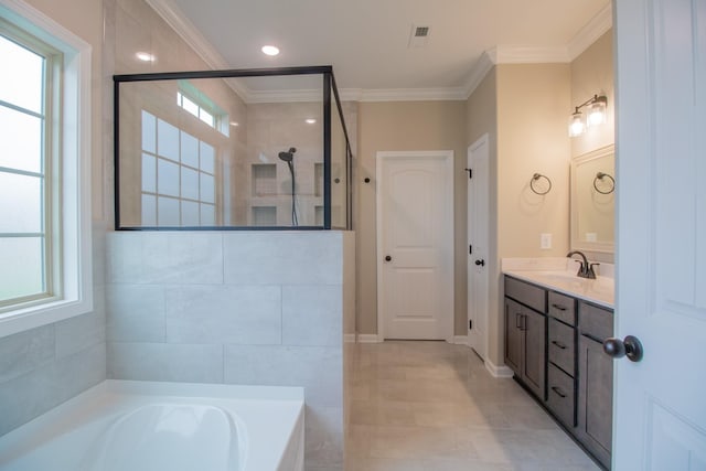 bathroom featuring a healthy amount of sunlight, a bath, crown molding, and a tile shower