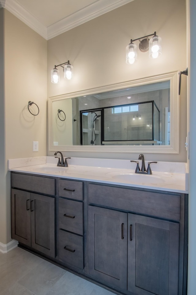 bathroom featuring ornamental molding, a stall shower, and a sink