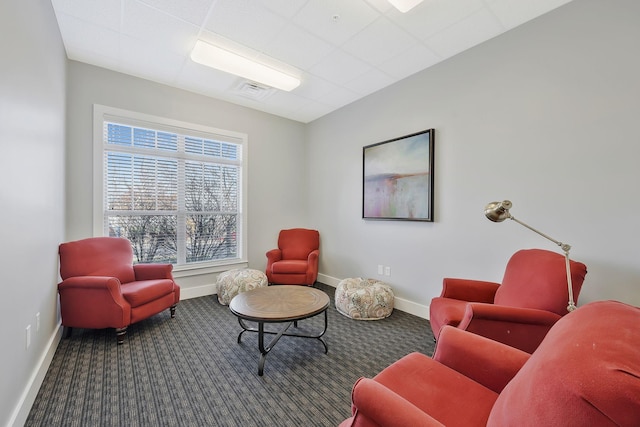 interior space with carpet flooring and baseboards