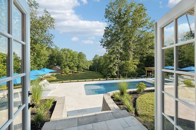 pool with a patio