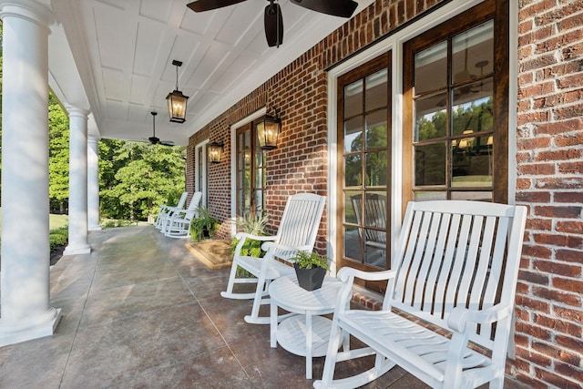 view of patio featuring ceiling fan and a porch